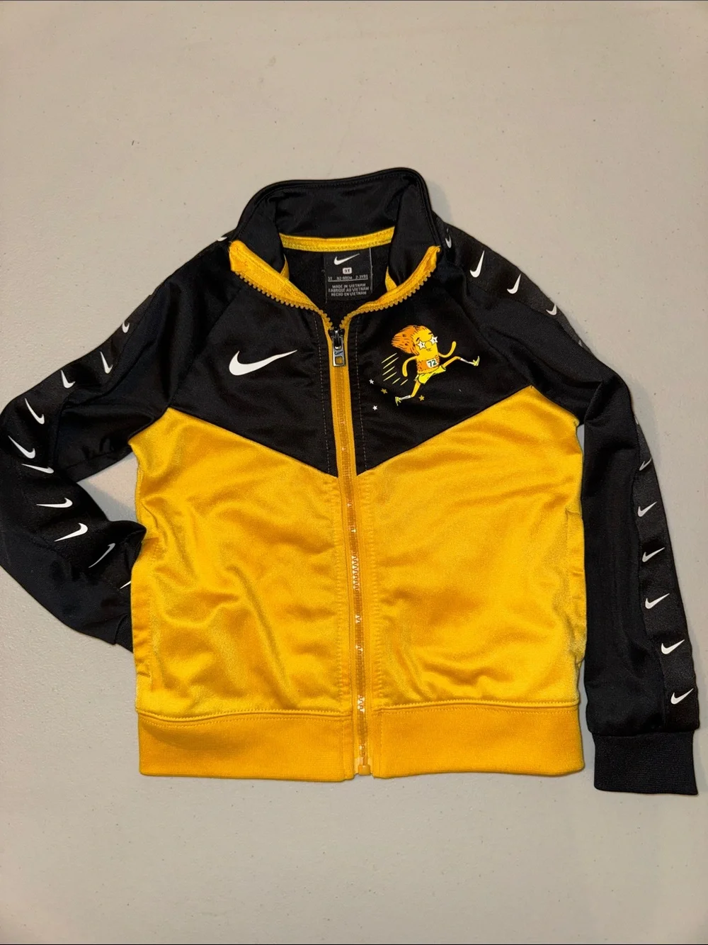 Nike Black and Gold Youth Zip-Up Track Jacket with Lion Runner Graphic